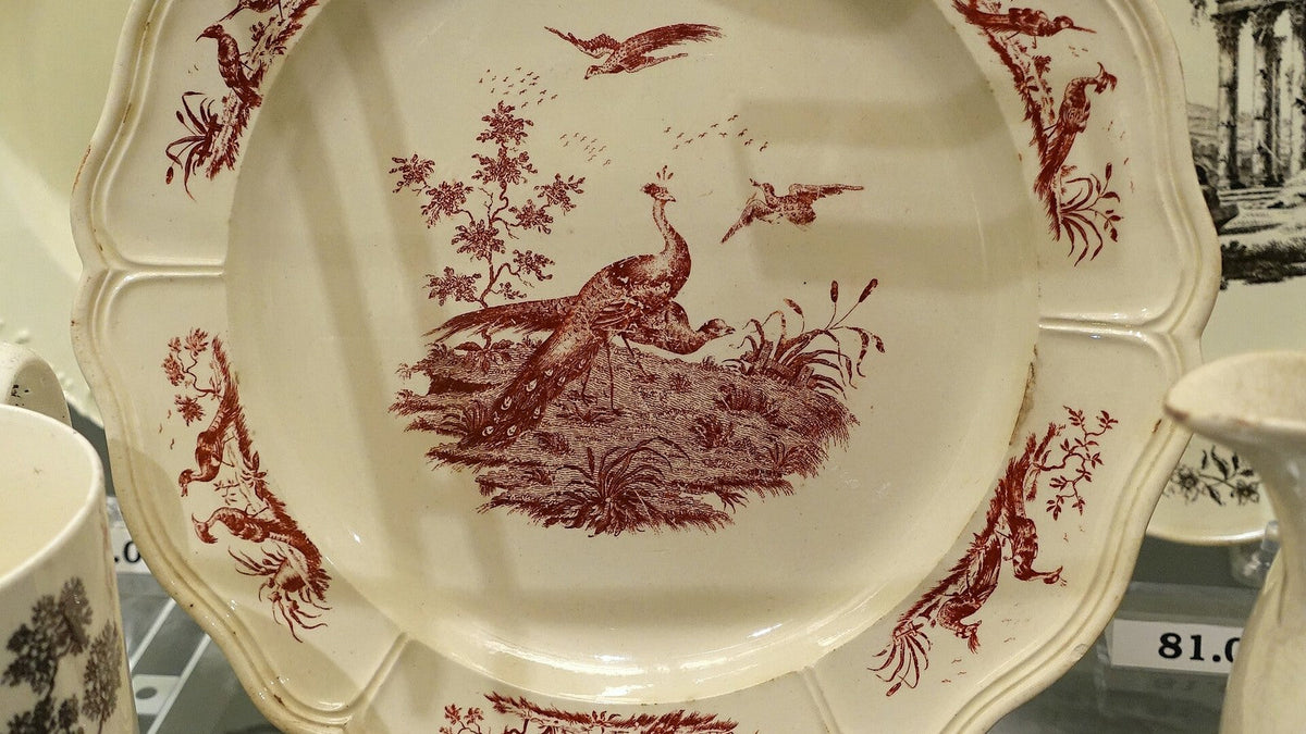 Creamware plate with a transfer-printed Liverpool Birds pattern