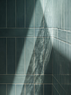 Aerial ceramic tile installation detail with natural light