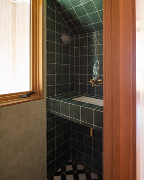 Grove 5x5 green ceramic tile bathroom installation