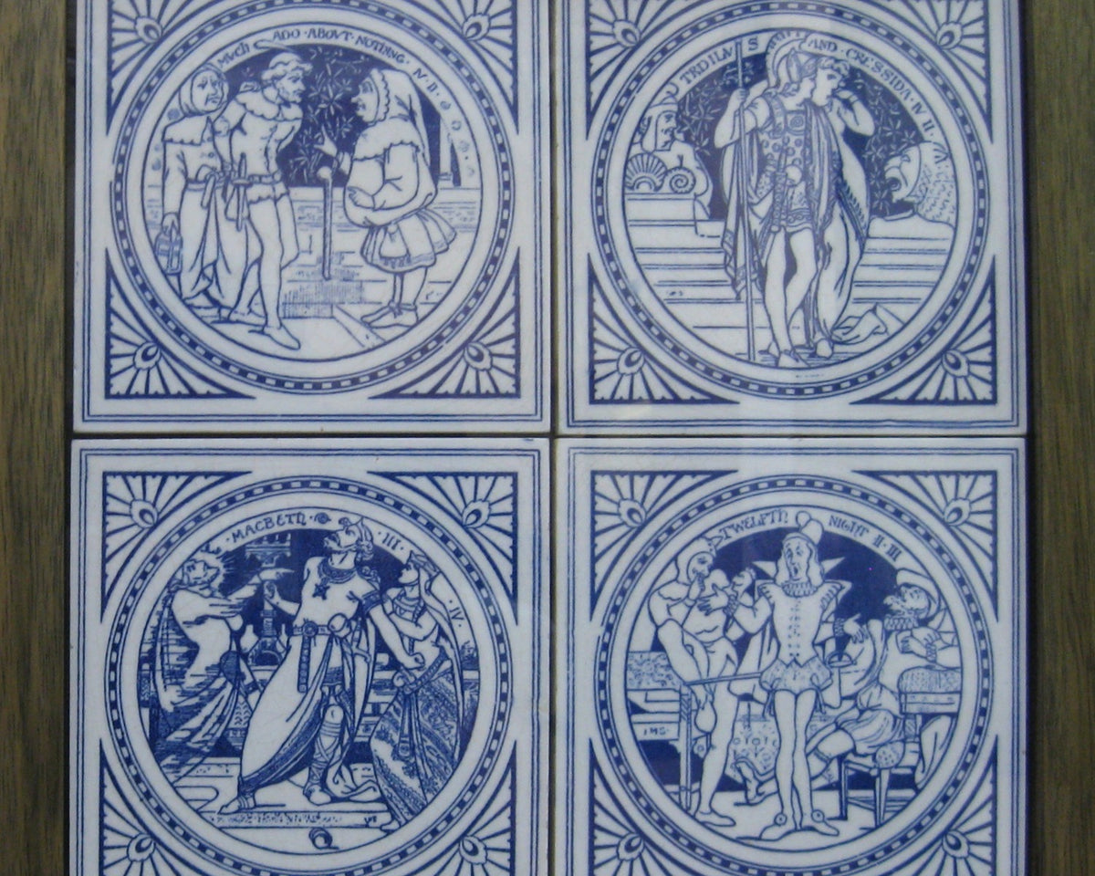 Four blue-and-white Minton tiles illustrating Shakespeare scenes in circular medallions.