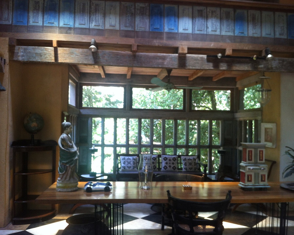 Interior at Lunuganga with patterned floor and garden beyond
