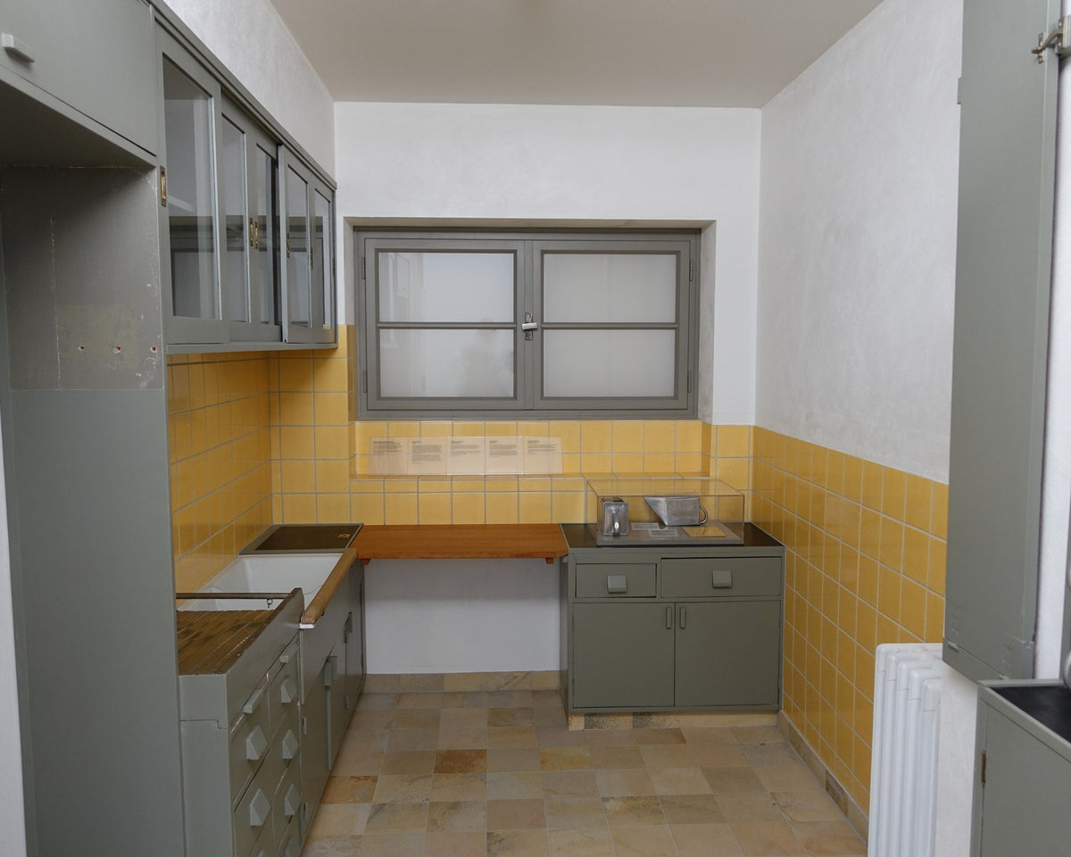 Reconstructed Frankfurt Kitchen with compact work surfaces and storage