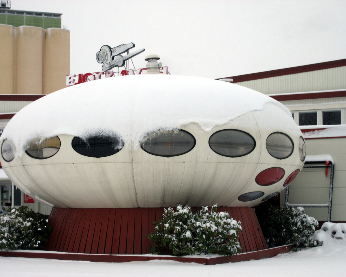 Futuro House standing in a wooded landscape
