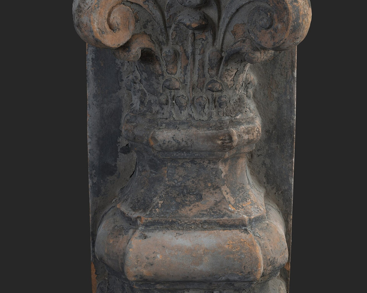 Terracotta architectural ornament with Corinthian capital and rosettes