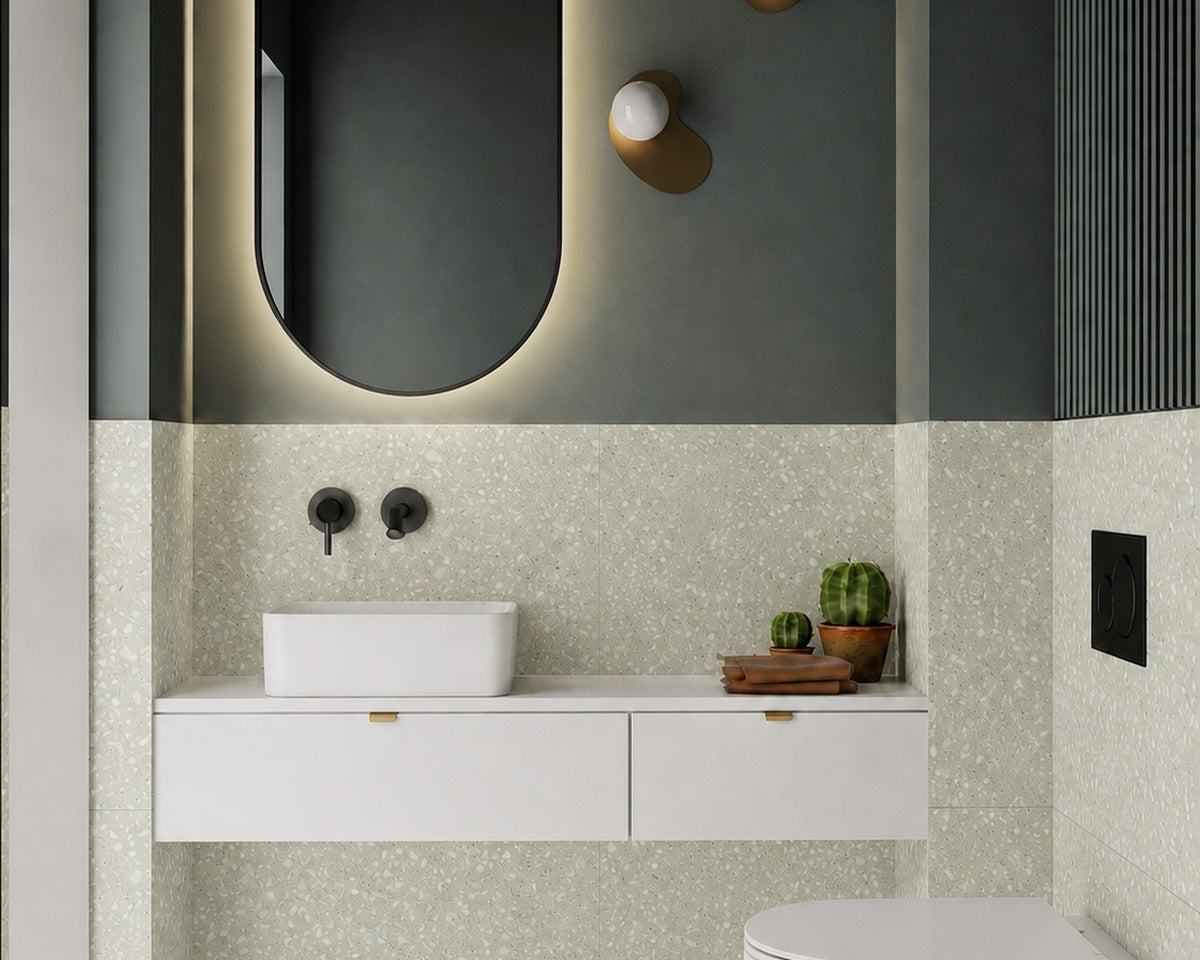 Wicked terrazzo tile installed in a bathroom with an olive green wall