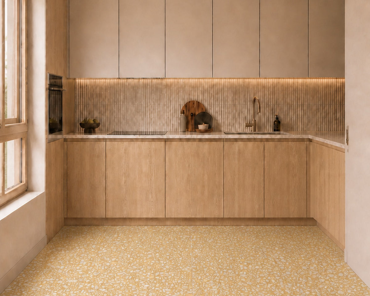 Lion terrazzo tile installed in a warm wood kitchen