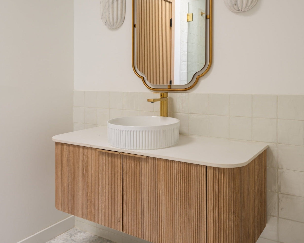 Primavera marble mosaic installed in a bathroom receiving daylight