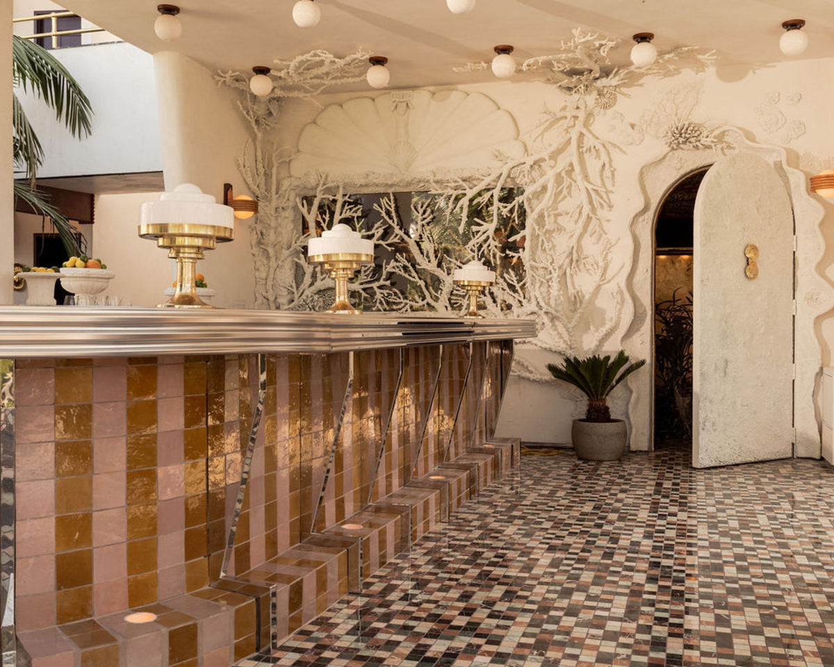 Mosaic floor and tiled bar inside The Baby Grand cafe