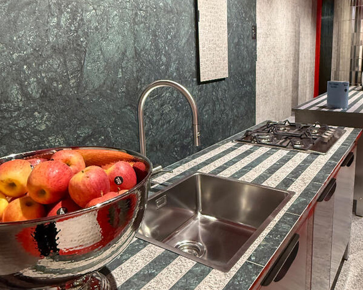 Tile-drenched kitchen installation photographed at Cersaie 2025