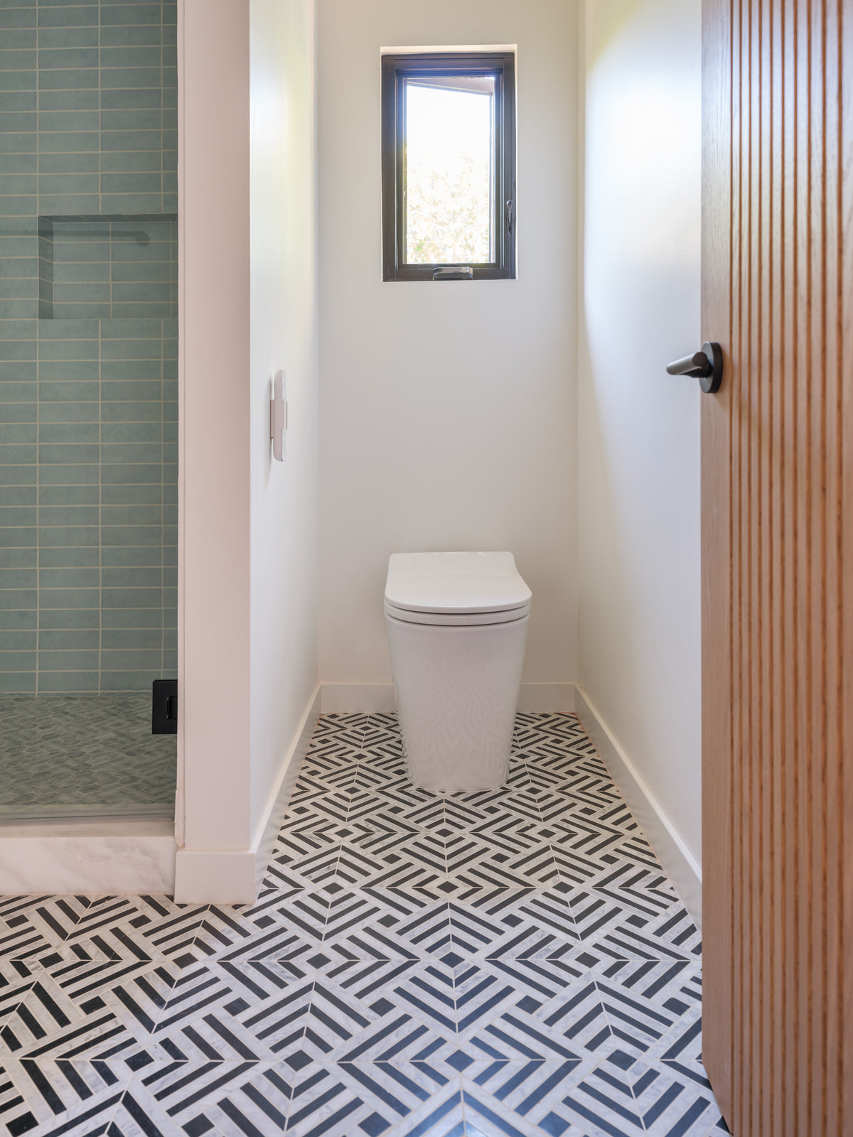 Parallax Noir marble mosaic bathroom installation